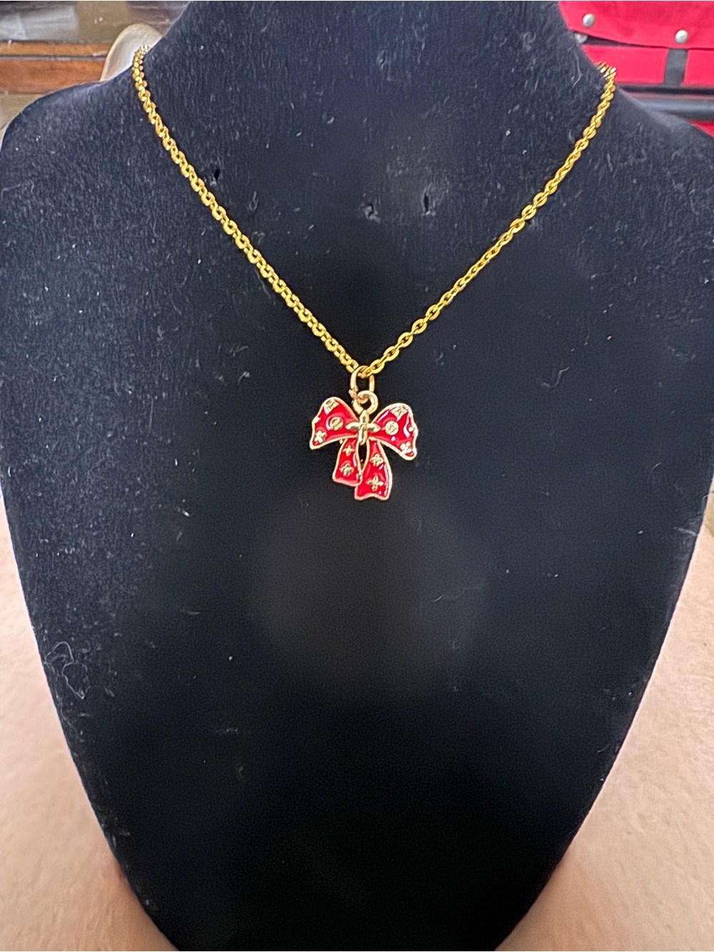Louis Vuitton Red Bow Charm Pendant with Gold Accents
